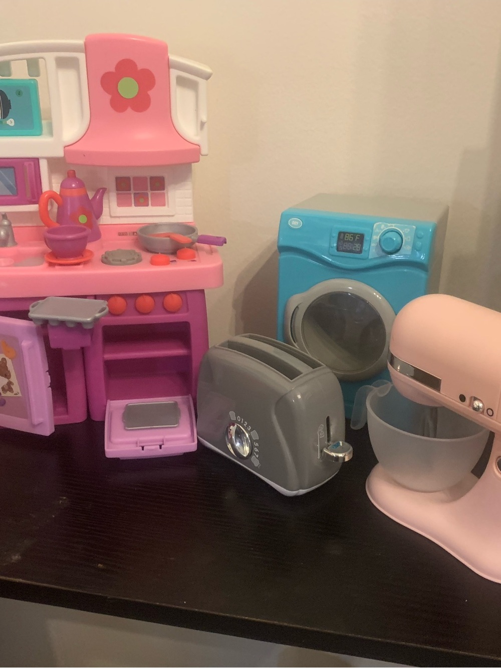 My little kitchen, stove, pots,pans, dishes, blender, toaster, mixer , washer